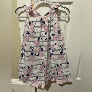 White and pink sleeveless dress with blue floral designs